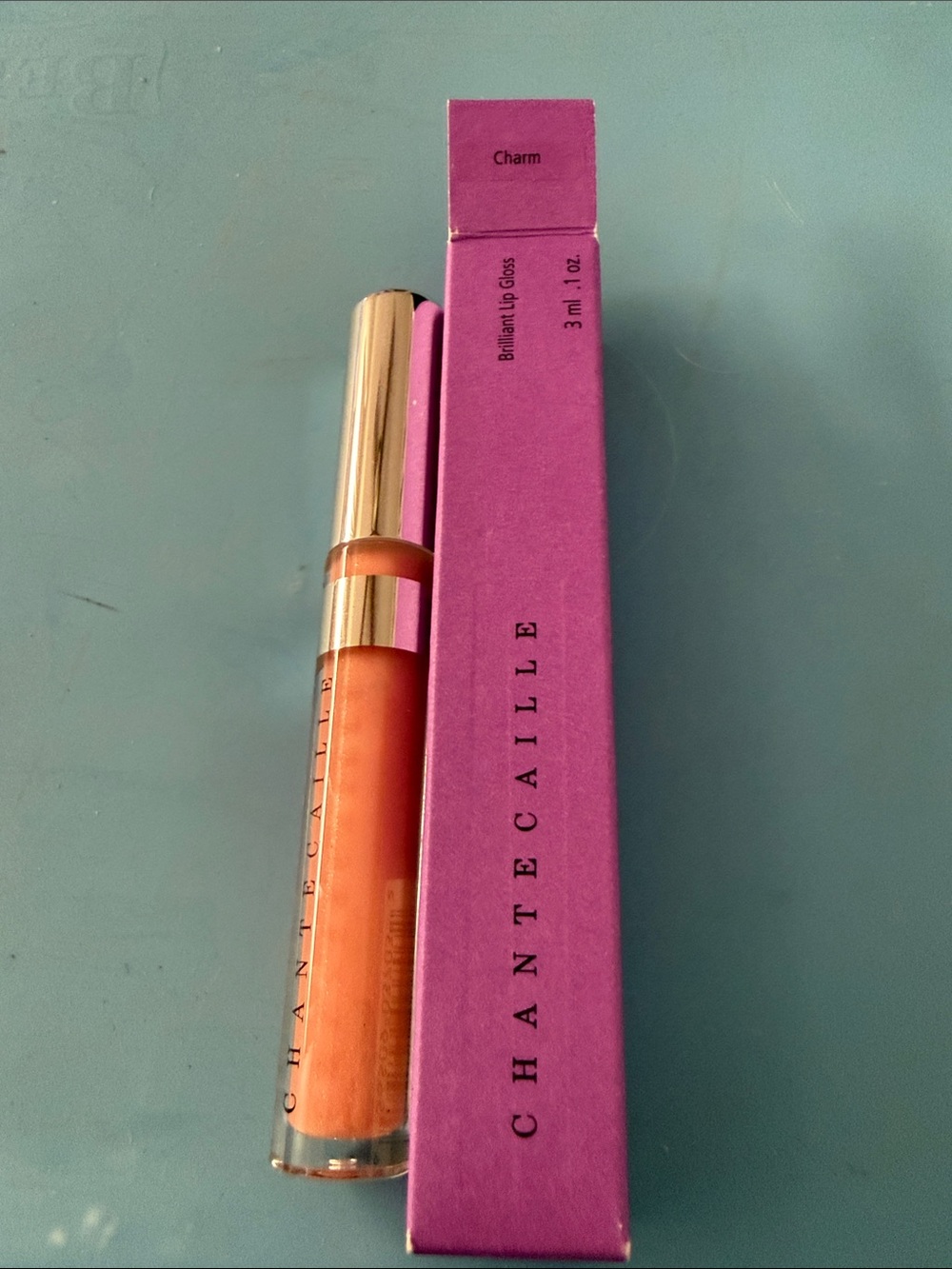 Chantecaille Charm Orange Lip Gloss - Shimmering Orange